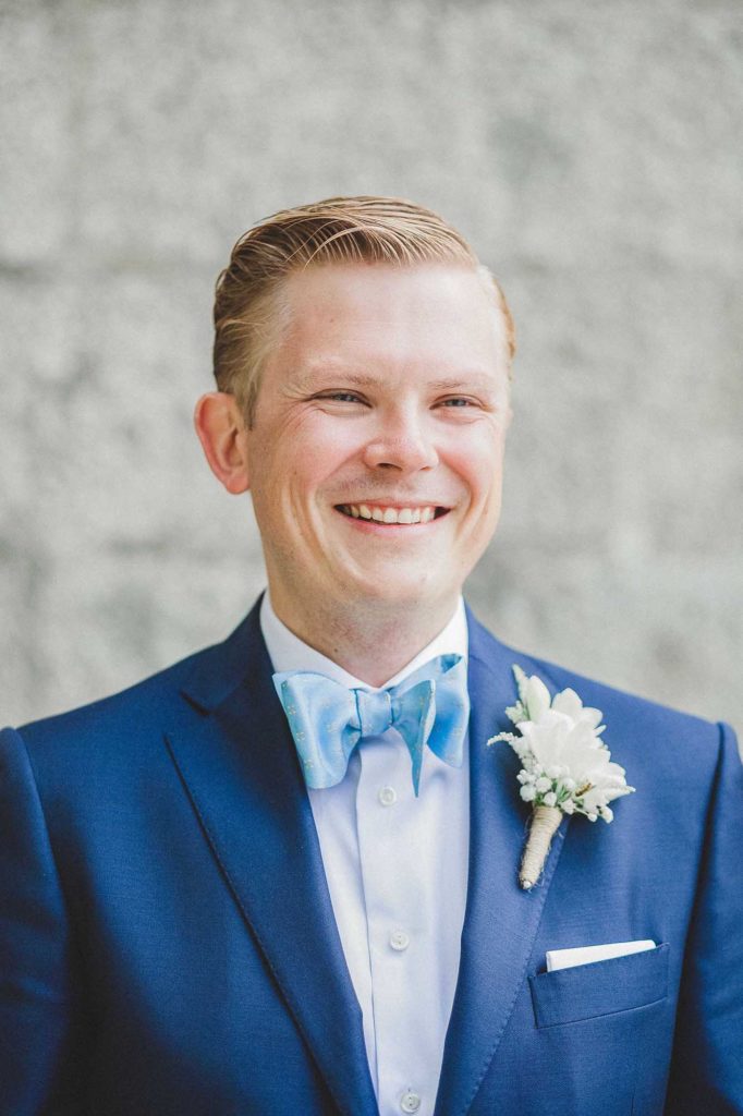 blue bow tie and blue suit for groom style inspiration