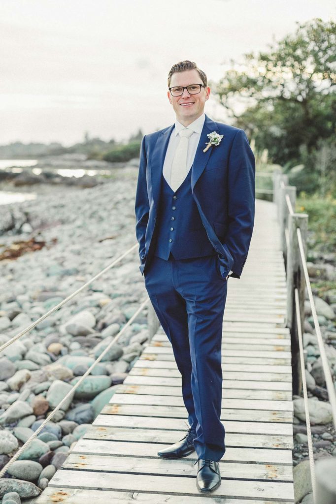 blue suit and white tie for groom style inspiration