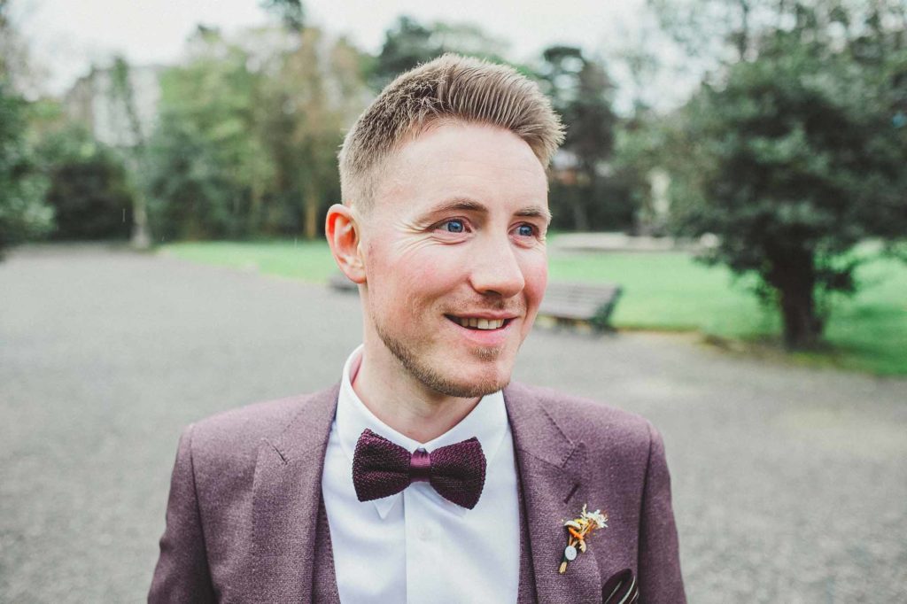 Groom purple tie with purple suit for groom style inspiration